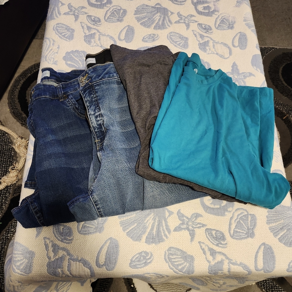 2 pair of jeans and 2 t-shirts